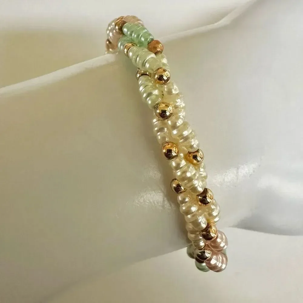 Faux pearl twisted multi strand bracelet